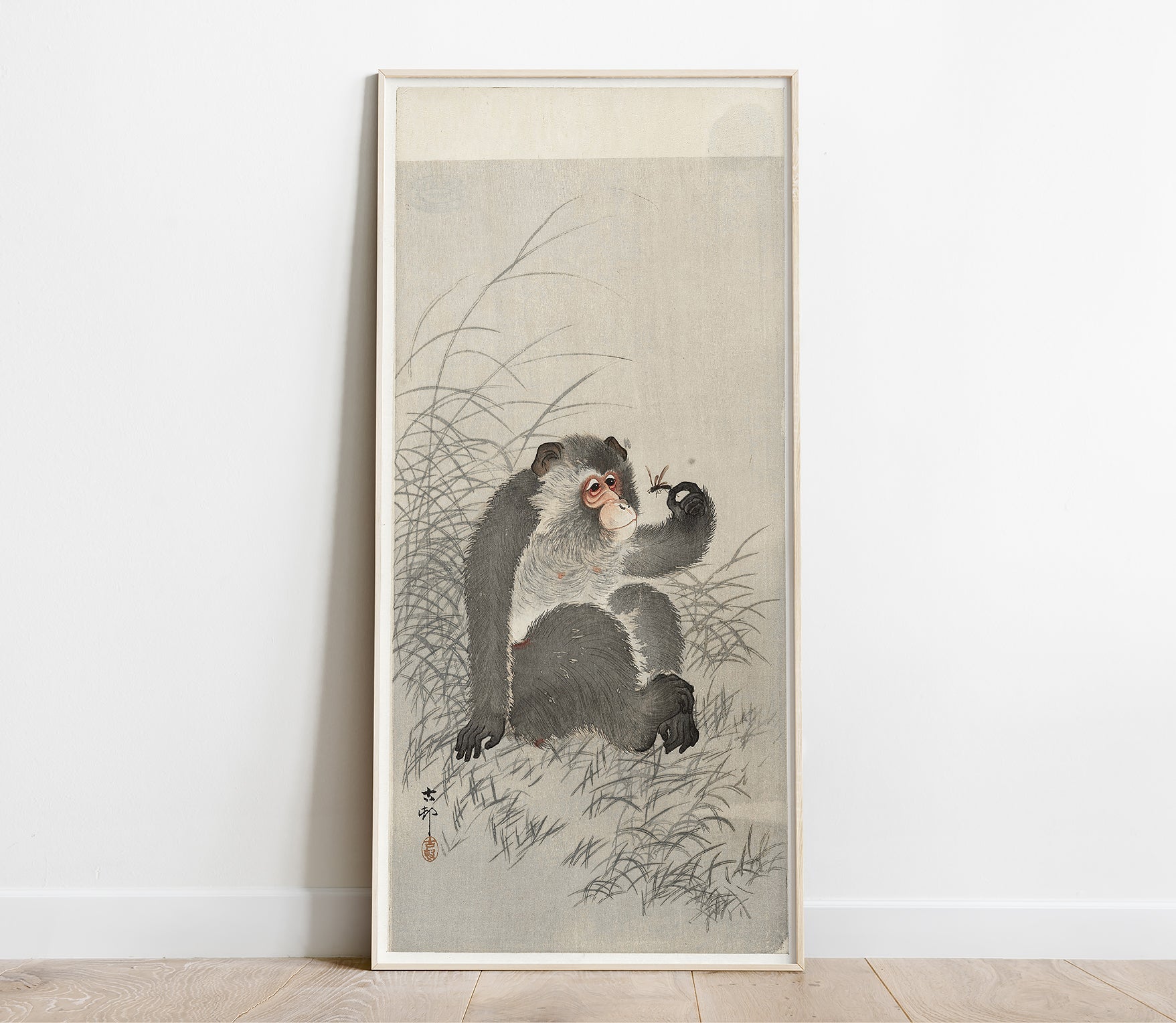 Preview of the art print Monkey With Insect by Ohara Koson, mounted in a poster frame